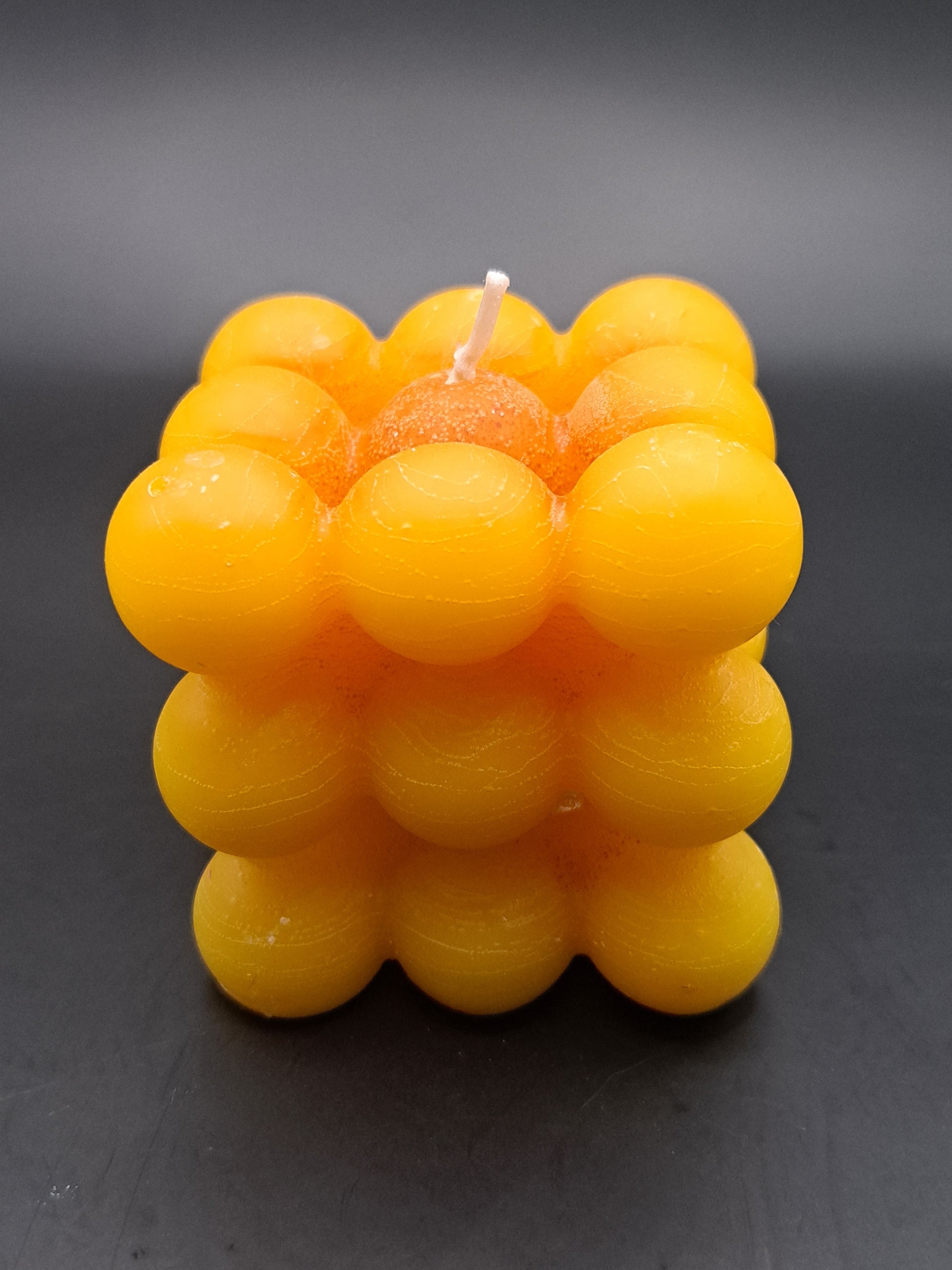 Yellow bubble cube candle